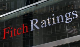 Fitch: приватизация